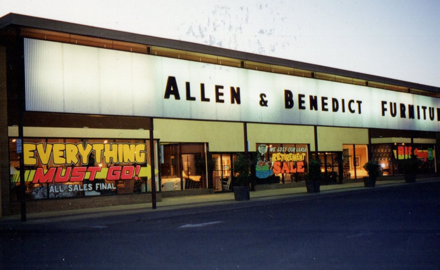 Before the outlets - Allen & Benedict store closing sign at night